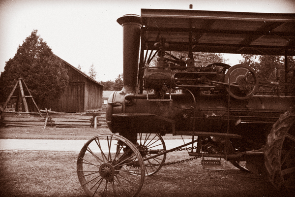 Old steam powered farm tractor